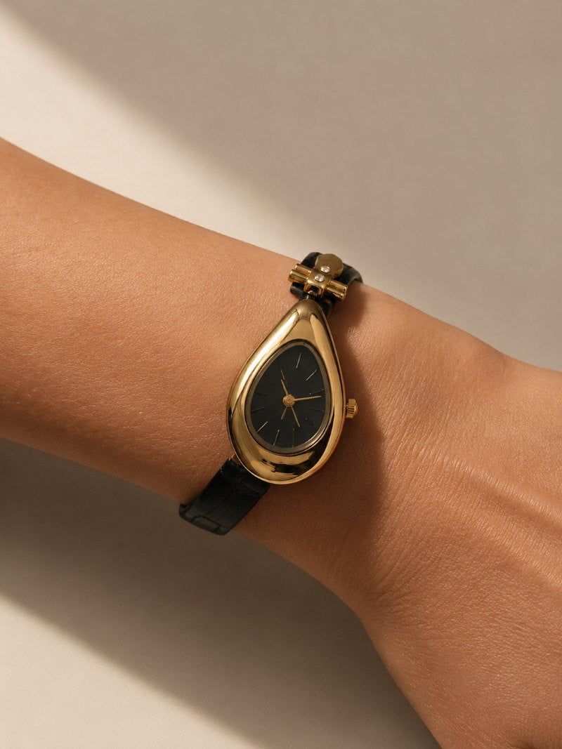 Leather-strap watch, worn on the wrist