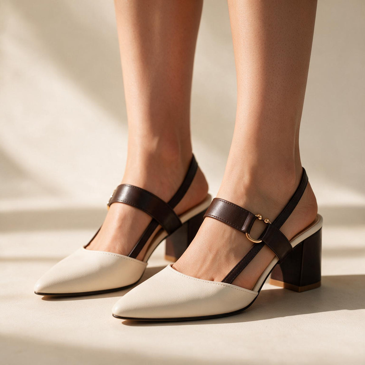 Sterling Quinn ivory slingback block heels worn