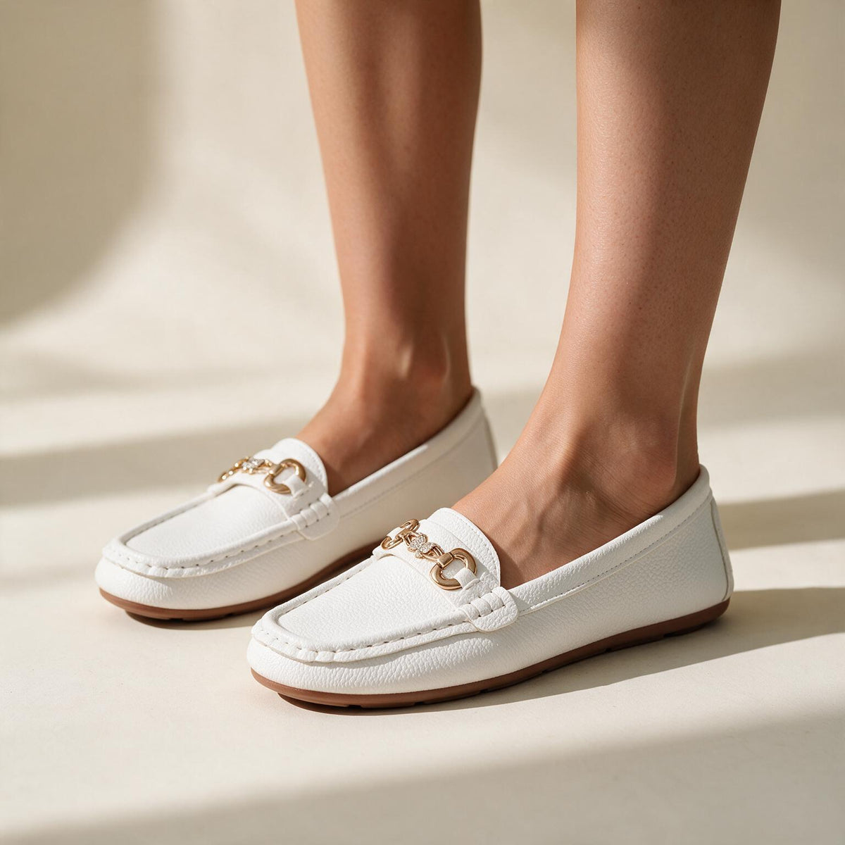 Capri Chain white loafers worn