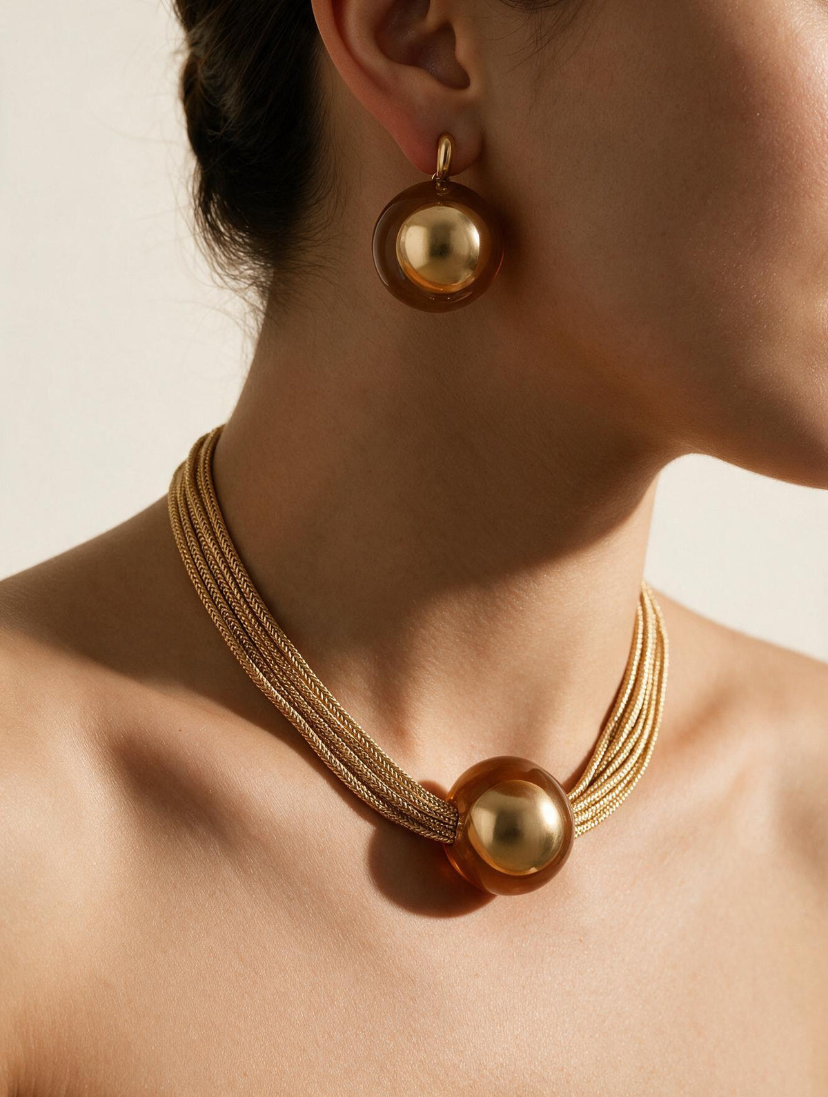 Matching necklace and earring worn together