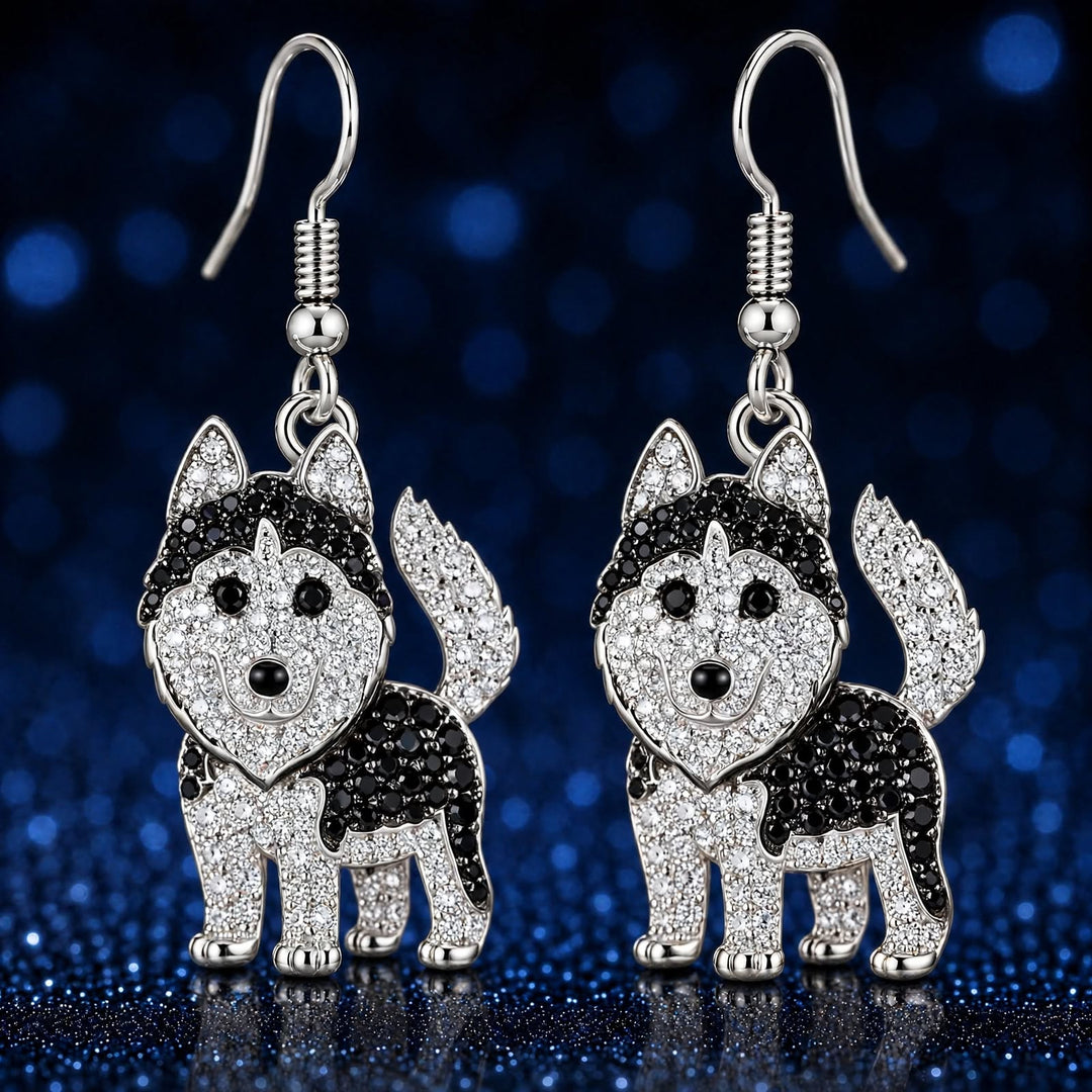 Pair of standing husky rhinestone earrings, French hooks at top, on a dark blue sparkle backdrop