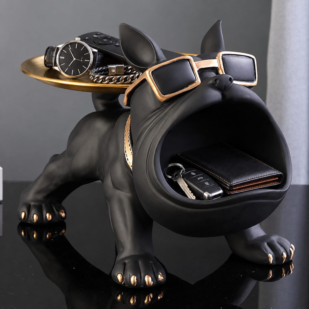 Matte Black french bulldog tray with a gold-tone tray on its back and keys in its open mouth