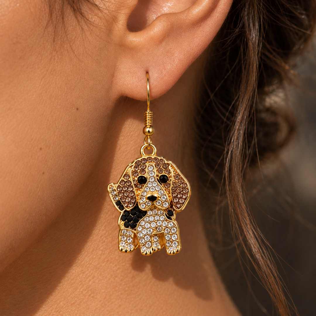 Beagle earring worn on the ear, the seated dog hanging from a gold-tone French hook