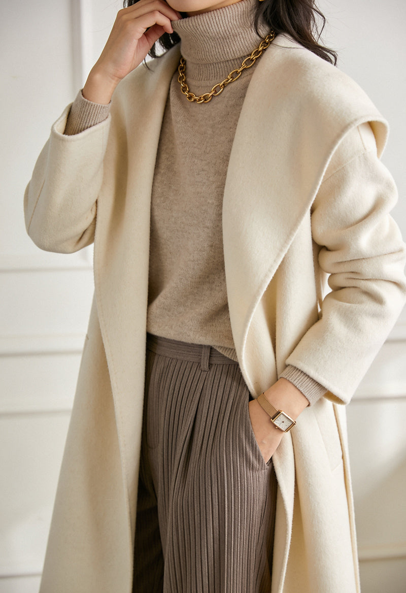 Hero card - woman in cream coat